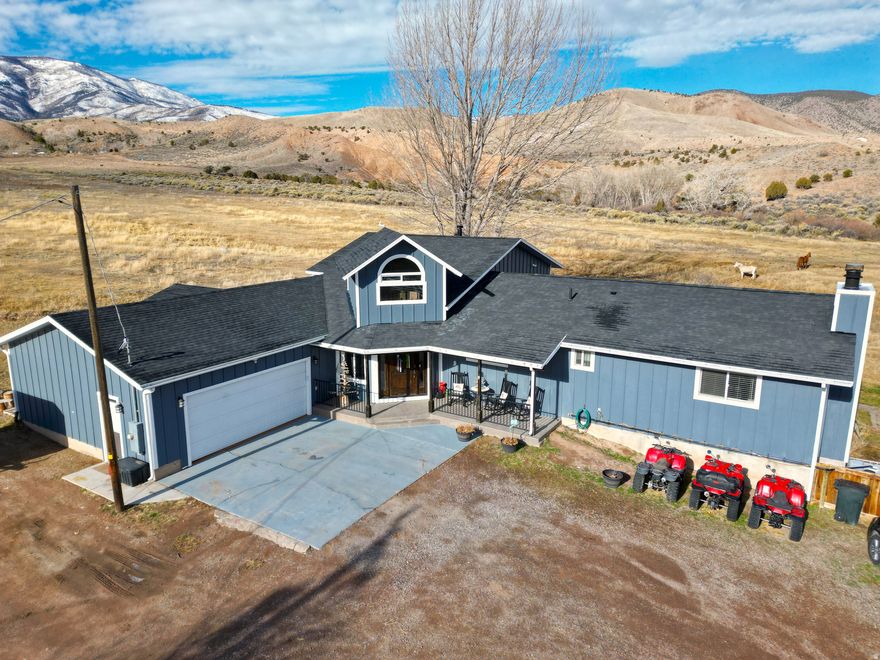 If wide-open spaces, mountain views, and instant trail access are high on your list, this Piute County property checks every box. Designed for those who love the outdoors without sacrificing comfort, this thoughtfully transformed home sits on 1.4 acres with animal rights making it ideal for horses and other livestock including cows, goats, and chickens. With unmatched access to the Piute ATV trail system, you can ride straight from your driveway and fully embrace the rural lifestyle.  The residence has been fully updated from top to bottom and blends modern upgrades with one-of-a-kind charm. Inside, you'll find four bedrooms plus a bonus room in the basement, all wrapped around an inviting open-concept layout ideal for gatherings. The primary suite is a true retreat, featuring a private porch overlooking the Tushar Mountains-perfect for morning coffee or winding down at sunset.  Comfort is enhanced with two wood stoves and extensive electrical and plumbing upgrades throughout, including 200-amp service and PEX water lines. Outside, the property truly shines with space and versatility. The fully enclosed backyard is perfect for dogs or kids, offering peace of mind while still enjoying the outdoors. There is also RV parking with 50-amp power, water, and sewer hookups, adding flexibility for guests, travel, or additional storage. Recent improvements include a new roof (2022), updated appliances within the last three years, and a custom coffee bar.  Originally built in 1978 with a major addition completed in 2022, this home feels entirely new while still embracing its roots. Whether you're seeking a full-time residence or an adventure-ready getaway, this property delivers space, function, and direct access to everything Piute County has to offer.