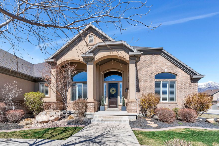 Highland is still one of the most sought-after pockets in Utah-and it's easy to see why with homes like this. Quality always wins! Your own private park in the heart of Highland.  This isn't just a house; it's the retreat you've been waiting for. Meticulously updated from top to bottom, this Highland gem combines timeless elegance with peace of mind. Main Floor Luxury: Step onto genuine hardwood floors and into a space flooded with natural light. Every window offers a curated view, framing the beauty of  our mountains. The heart of the home features  a large kitchen with custom cabinetry and a great room with a stunning 2-way fireplace that adds warmth and character to your daily living. With complete main-floor living, everything you need is right at your fingertips. The Ultimate Guest or Multi-Gen Suite: The walk-out basement is a showstopper. Featuring a full second kitchen and a massive family room, this space is essentially brand new and barely lived in. Whether it's for long-term guests, entertaining, or a dream hobby space, the storage capacity here is truly unparalleled. An Outdoor Oasis: The grounds feel like a personal park. Professionally landscaped with soothing bubble fountains in both the front and back, you can enjoy the mountain air from the expansive front porch or the covered back deck. As the sun sets, enjoy the  patio's gas firepit for the perfect Utah evening. Space for Every Toy: Storage doesn't stop inside. This home features a large 2-car garage plus an extra-deep 3rd-car bay and the wide RV pad everyone is looking for. Pride of ownership and excellence in design shine through every detail. Welcome home.