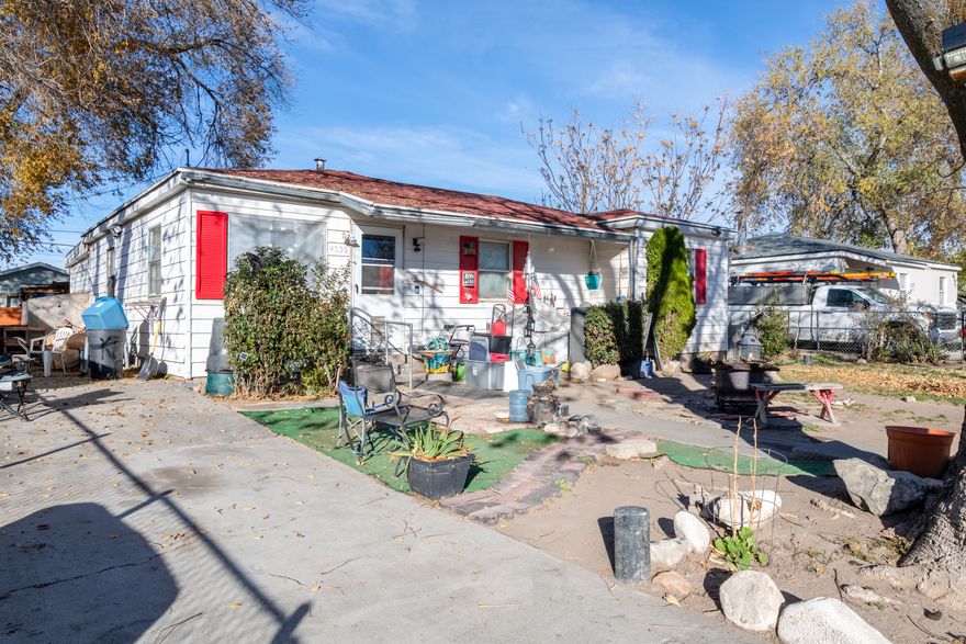 Great investment opportunity for a fix and flip, or investment. The home is unique with 3 bedrooms, space for a 4th, on a single level and a fully fenced yard. The interior is outdated but could be the shining star of the neighborhood with a new kitchen, bathroom, flooring, paint & landscaping. Great Location - located about a block away from a main street of 5400 S. Good sized backyard with mature trees. Square footage figures are provided as a courtesy estimate only and were obtained from county records. Buyer is advised to obtain an independent measurement. Email offers to agent, call or text to confirm receipt.