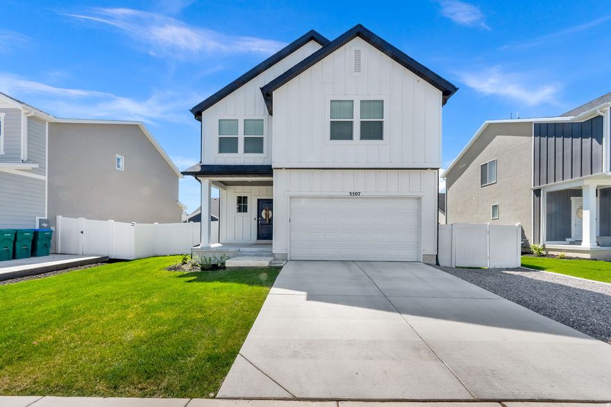 Absolutely stunning, like-new home in the highly sought-after Spring Ranch community! Built in 2024 and impeccably maintained, this home truly shows pride of ownership throughout. Thoughtfully designed with a bright, open, and functional layout, plus a fully landscaped and fenced yard perfect for enjoying Utah evenings. Loaded with smart home upgrades including a Google Nest doorbell, WiFi thermostat, WiFi-controlled lighting, and motion sensor lights in the walk-in closet, pantry, and garage. Enjoy incredible HOA amenities including a pool, clubhouse, and scenic trails. This is a rare opportunity to own one of the newest and most beautifully cared-for homes in the subdivision-don't miss it!A
