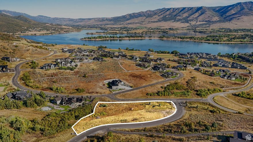Welcome to Lot 39 at Legacy Mountain Estates in beautiful Huntsville. This gently sloped corner building lot offers 2.25 acres above Pine View reservoir overlooking the Huntsville Valley. Build your dream home just 5 miles from Snowbasin Ski Resort and enjoy the expansive trail system right out your back door. Water and sewer connection fees have been paid, and all utilities are stubbed including high-speed fiber internet. Legacy Mountain Estates boasts 280 acres of serene mountain landscape with large, fully developed home sites where luxury meets nature. Your mountain living dreams begin here!  While all information is deemed reliable, buyer to verify all property details, boundaries, and documents.