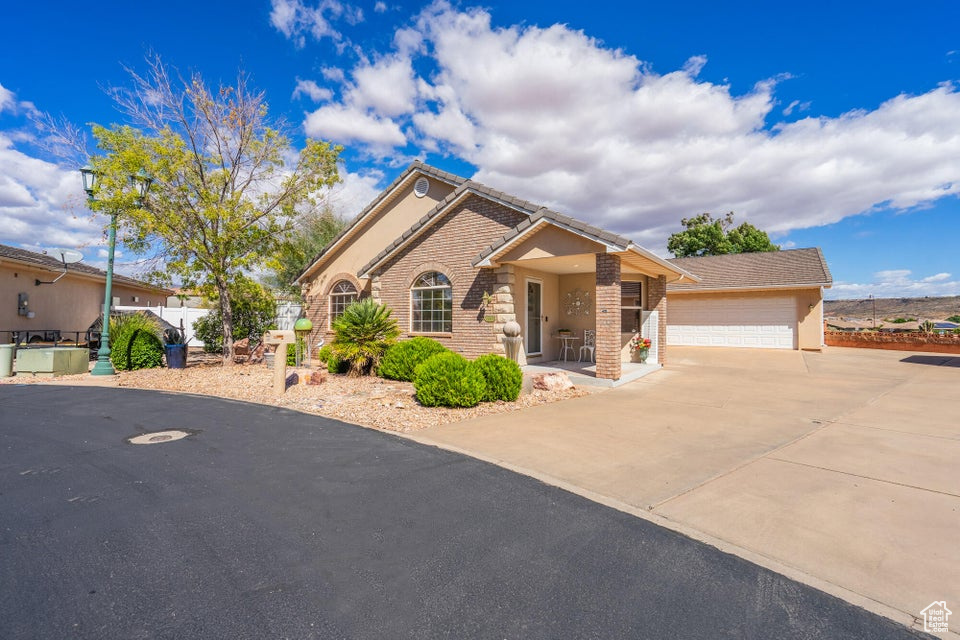 Your Private Oasis Awaits! Discover this meticulously maintained 2-bed plus Den, 2-bath home offering comfort and flexible living all on one level. The gently used kitchen features classic oak cabinets, flooring, and solid surface countertops. Relax in the Master Suite with its private patio and incredible artist / bonus room. The versatile Den is perfect as a third bedroom, office, or creator space. Enjoy stunning, serene views of the north and east mountains from your fully landscaped yard. Best of all, convenient location to everything and exclusive, year-round access to the spectacular Clubhouse with a heated indoor pool and relaxing hot tub and direct access to walking trails. This is maintenance-free living with resort-style perks. Contact me today for a personal tour!
