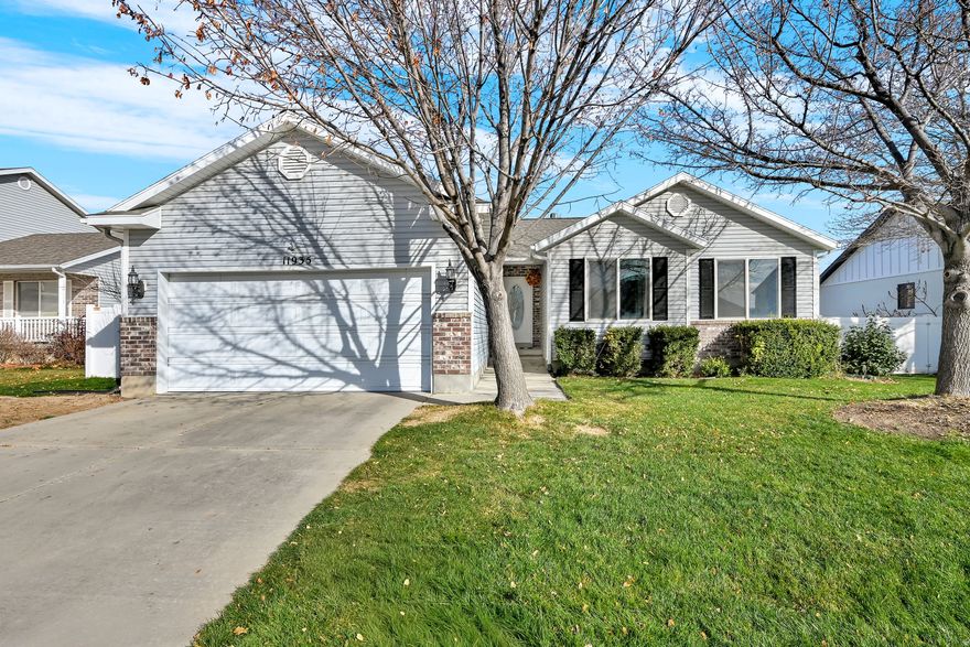 Well-maintained 5 bed / 3 bath Herriman home with 2,298 sq ft. Spacious gathering and living areas, main floor laundry, and a private primary suite with its own bath and walk-in closet. Kitchen and bathrooms feature updated quartz countertops. New roof with ridge vents. Backyard includes a comfortable outdoor space with a vegetable garden and drip system, ideal for recreation or entertaining. No HOA. Conveniently located near walking paths, parks, shopping, and the Daybreak TRAX station for easy commuting. Move in and enjoy a welcoming home for the holiday season, with room to host and relax.