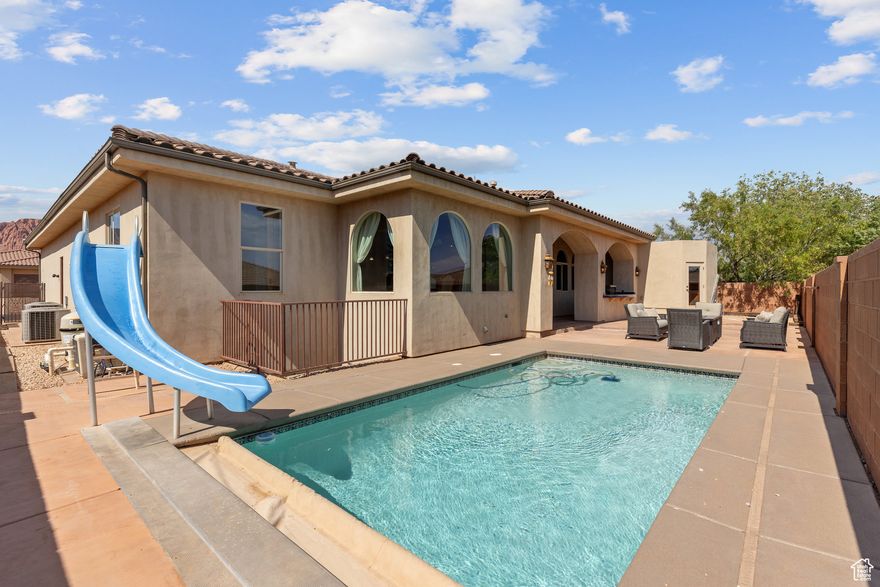 Your perfect Tuscany retreat in the heart of Ivins awaits! This home truly has it all - from the sparkling pool and private courtyard with gorgeous views, to the oversized 4-car garage that fits all your gear. The home features a remarkable multi-level layout perfect for entertaining and creating memories with family and friends. At the entrance, you are welcome by the serene sounds of the water feature in the large courtyard. Once you walk through the large arch glass wooden doors, you will experience a large open floor concept that includes the large upstairs living room, kitchen, and dining area with large mountain view windows. The home features 5,544 SqFt (2,772 on each floor), 6 bedrooms, 6 bathrooms, theater room, 2x flex rooms, Office/Den, large storage room, granite honed edge countertops throughout, and wood beam living room ceilings. Inside, the kitchen is a chef's delight with a large multi-tier island, a built-in fridge, and a hidden pantry big enough for all your needs, knotty alder cabinets, 6 burner chef freestanding stove, and built-in swivel island chairs. The spacious primary bedroom is a relaxing escape, complete with its own secluded flex room, a custom built-in closet, a spa-like bath with a triple-head shower, separate soaking tub, and large sauna room. The finished basement has a large 2ndliving room that is perfect for a game room. Movie nights? This home has you covered, thanks to your very own theater room. You'll also love the large mudroom, laundry space, kitchenette, and a den perfect for work or hobbies. The outdoor space is a wonderful entertainment space with Outside, fire up the built-in barbecue and fridge under the covered patio, and enjoy effortless entertaining.  The home is near the Greater Saint George paved bike/walking trail system with over 50 miles that connects you across the city, including the iconic Snow Canyon State Park, Sullivan Soccer Park, and miles of beautiful Red Rock terrain. Minutes from amenities in downtown Saint George, such as over 16 golf courses including Black Desert Golf Course home to the Fall 2024 PGA TOUR's FedEx Cup, hiking and cycling trails, and a short drive to some of America's most awe-inspiring places; National parks Zion, Bryce and the north rim of the Grand Canyon, and state parks like Sand Hollow Reservoir, Gunlock Reservoir, Quail Creek Reservoir, and nearby Dixie National Forest. The City of Ivins is known for its low light pollution initiative to protect its night sky and for its breathtaking views of Red Mountain. There is no doubt that the word is out that at 2,700 feet above sea level, on the edge of the Mojave desert, Colorado Plateau, and the Great Basin, lies one of America's most beautiful and distinctively geological places, Saint George! No other place says that you have arrived than this beautiful home.  All information herein is deemed reliable but is not guaranteed. The buyer is responsible to verify all listing information, including square feet/acreage, to the buyer's own satisfaction.