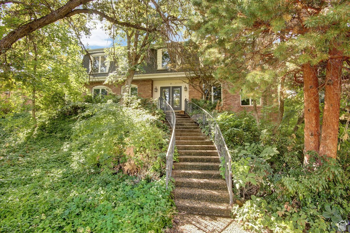 Stunning 5-Bedroom Home with Private Oasis on a Corner Lot + In-Law Apartment Welcome to your dream home! Nestled on a spacious corner lot, this beautifully maintained 5-bedroom, 4-bathroom residence offers the perfect blend of comfort, functionality, and style. Designed with entertaining in mind, the property boasts a private backyard oasis complete with lush landscaping including a spring creek, ideal for gatherings, relaxation, or enjoying a quiet evening on the patio. The main home features a thoughtfully designed floor plan with generous living spaces, updated finishes, and abundant natural light throughout. The open-concept kitchen flows seamlessly into the dining and family rooms, making it the heart of the home for everyday living and special occasions alike. A rare gem, the separate mother-in-law apartment offers a private entrance, full kitchen, living area, bedroom, and bathroom-perfect for extended family, guests, or rental income potential.