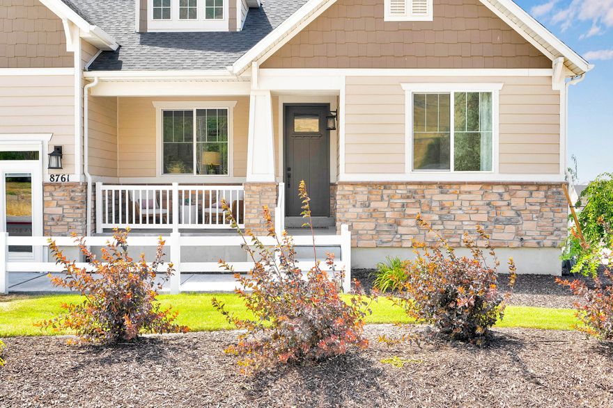 Welcome Home to Elevated Elegance Step onto the charming front porch and take in the breathtaking views of the Oquirrh Mountains, a stunning backdrop to your daily life. As you cross the threshold, you're greeted by a beautifully appointed study with elegant French doors, perfect for quiet work or reflection.  A thoughtfully placed powder room offers convenience for guests, while two spacious bedrooms share a well-designed full bath, ideal for family or visitors.  The heart of the home unfolds in the open-concept kitchen and great room, where vaulted ceilings, a warm fireplace, and an oversized granite island create a space that's both sophisticated and inviting. Enjoy abundant cabinetry, perfect for all your culinary inspirations, and a semi-formal dining area that flows seamlessly to the covered patio; a tranquil retreat connected to the Owner's Suite.  Indulge in the luxurious Owner's Suite, complete with dual closets, a large walk-in shower, and a serene sitting are, the perfect sanctuary to unwind.  Upstairs, discover a private guest suite, featuring a spacious bedroom, walk-in closet, and full bath, offering both comfort and privacy.  The lower level is designed for entertainment and relaxation, showcasing a generous gathering space, custom wet bar, and another gracious suite for guests.  Every detail of this home has been crafted for comfort, style, and enjoyment; a place where elegance meets ease, and every moment feels extraordinary.