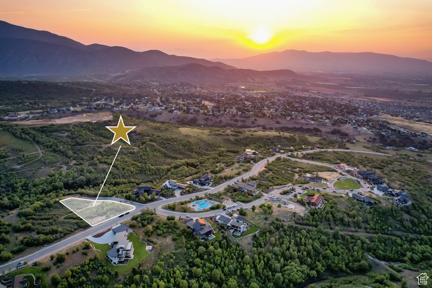 Rare flat lot at Summit Creek-save on build costs while enjoying incredible mountain and valley views. This private corner lot offers flexible driveway options, natural wooded charm, and backs to 70+ acres of protected open space. Just steps from community amenities including pool, fitness center, pickleball courts, and miles of trails. The perfect setting for your dream home in a premier master-planned community.