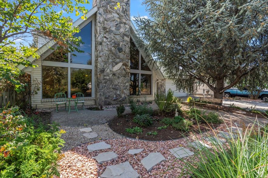 Have you been dreaming of your own private oasis with the convenience of being near the city? Then THIS IS IT!!! Tucked away in the heart of Cottonwood Heights, this one-of-a-kind retreat offers the serenity of a private sanctuary with the convenience of city living just minutes away. From the moment you arrive, you'll feel transported - surrounded by lush landscaping, vibrant gardens, and the gentle sounds of a tranquil koi pond, on a large .34 acre lot, rare for the area. Step inside and you'll find a home that's been lovingly updated from top to bottom. Nearly everything is brand new - from the Energy Star appliances (including refrigerator, stove, dishwasher, microwave, washer, and dryer) to the new flooring, fresh paint, and beautifully maintained bathrooms. The floor-to-ceiling original stone fireplace anchors the great room, filling the space with warmth and character, while expansive tinted windows flood the home with natural light and frame peaceful garden views, without sacrificing privacy. Off one of the main floor bedrooms you'll find an enclosed greenhouse, perfect for bringing the outdoors in and a garden enthusiast's dream. Upstairs in the primary suite you'll find a balcony deck overlooking the amazing landscaping. The backyard is truly a showstopper, a lush oasis featuring a tranquil koi pond, flower and vegetable gardens with raspberries, figs, boysenberries, pears, peaches, plums, tomatoes, apples and dates, and multiple cozy outdoor sitting areas perfect for morning coffee or evening gatherings. Need space for hobbies or projects? The property also includes a heated detached 30X34 shop/garage with 220 power, ideal for woodworking, automotive work, or creative pursuits. And with an attached two-car garage and abundant storage throughout the home, there's a place for everything. This showstopping home is a must see with so many more unique features! Whether you're entertaining friends or simply soaking in the peaceful setting, this home delivers the perfect balance of beauty, functionality, and tranquility, right in the heart of Cottonwood Heights.  Square footage figures are provided as a courtesy estimate only and were obtained from a previous appraisal. Buyer is advised to obtain an independent measurement.