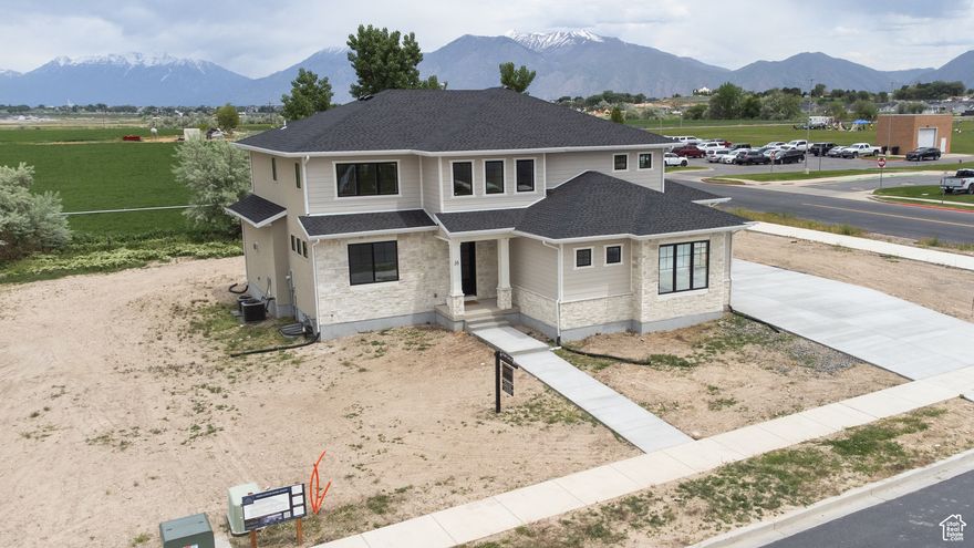 *** Price Reduced! & Reach out today to hear about our Builder & Preferred Lender Incentives!*** Welcome to Davis Farms in Salem, UT. Check out the Brae Plan from Dandelion Farms Custom Homes! This home boasts an oversize 3 car garage, Finished Basement with 2 Bedroom ADU to help you generate some Cash Flow! The home sits on a corner lot, across from Salem Jr High, Close to Stokes & Ace for your shopping needs, Stainless Steel Appliances, 4 Bedrooms upstairs, separate entrance & laundry for ADU. Many extras and upgrades. Square footage figures are provided as a courtesy estimate only and were obtained from Building Plans .  Buyer is advised to obtain an independent measurement.