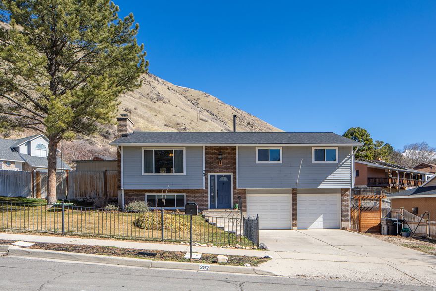 Welcome home to this fantastic property located in the foothills of Springville! With 4 bedrooms, 2 baths, 2 car garage and a large basement family room, this home is ready for a new family. The home has had all the big ticket items upgraded over the last few years. The central air and heater were replaced 2.5 years ago. The roof was replaced 1.5 years ago with architectural shingles and a ridge vet. The windows, sliding glass doors were replaced 4 years ago. The water heater was replaced 2.5 years ago. The home offers great views of the Wasatch mountains, essentially in your backyard! Don't miss your chance! Come see it today!