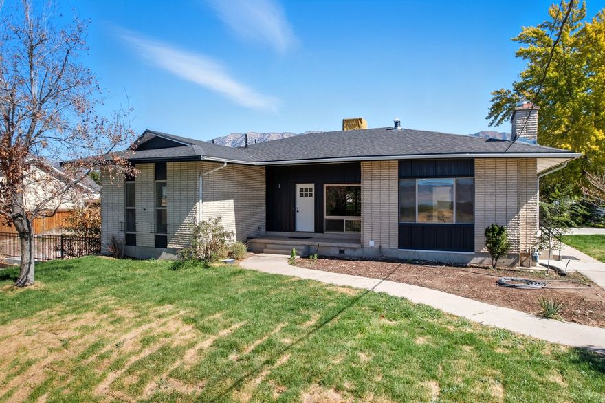 This incredible home now offers exceptional value with motivated sellers ready to make a deal.*** Welcome to this beautifully remodeled Provo home with a modern open-concept design. The spacious main living area is perfect for entertaining, highlighted by stylish finishes, a sleek kitchen with custom cabinetry, and abundant natural light. The fully finished basement includes a private one-bedroom, one-bathroom apartment with its own exterior entrance, making it ideal for rental income, guests, or multigenerational living. From the property, you can enjoy stunning mountain and lake views, while the large backyard offers a blank slate to create your dream outdoor space. A generous patio is perfect for gatherings, and the ample off-street parking provides plenty of room for cars, RVs, and outdoor recreation vehicles. This move-in ready home combines modern comfort, flexible living options, and unbeatable views in one desirable Provo location. Square footage figures are provided as a courtesy estimate only and were obtained from County Records. Buyer is advised to obtain an independent measurement.