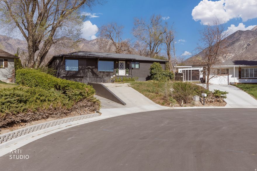 **Open House on March 28th from 12:00 PM2:00 PM** Welcome to your storybook cottage tucked just minutes from the mouth of both Big Cottonwood Canyon and Little Cottonwood Canyon, where mountain adventure meets cozy, garden filled living. Set on the largest lot in the neighborhood at .63 acres, this charming 7 bedroom, 3 bath home is surrounded by lush greenery, mature landscaping, and peaceful cottage style garden vibes that feel like your own private retreat. Inside, you'll find the warmth and character of a classic home with the big-ticket upgrades already done for you. Recent improvements include a brand new roof, new HVAC system, a whole-home humidifier, new windows, new electric water heaters, updated foundation via a gutter & pump system. The sewer lateral line was cleared of roots & relined from the house all the way to the man line with two clean outs installed. A water filtration system and new appliances (including fridge) add even more peace of mind. The living space features a custom sectional built specifically for the room, and it stays with the home creating the perfect cozy gathering spot. This home offers the best of both worlds: timeless character without the typical old home worries. While there are still a few small finishing projects left, the expensive and essential upgrades have already been taken care of. With easy access to world-class skiing, hiking, and year-round mountain recreation, plus plenty of room to grow, garden, and gather, this is a rare opportunity to own a truly special property in an unbeatable location. Charming, spacious, and thoughtfully updated, this peaceful retreat is ready to welcome you home.  Square footage figures are provided as a courtesy estimate only. Buyer is advised to obtain an independent measurement. https://my.matterport.com/show/?m=ZV59aP3j73k