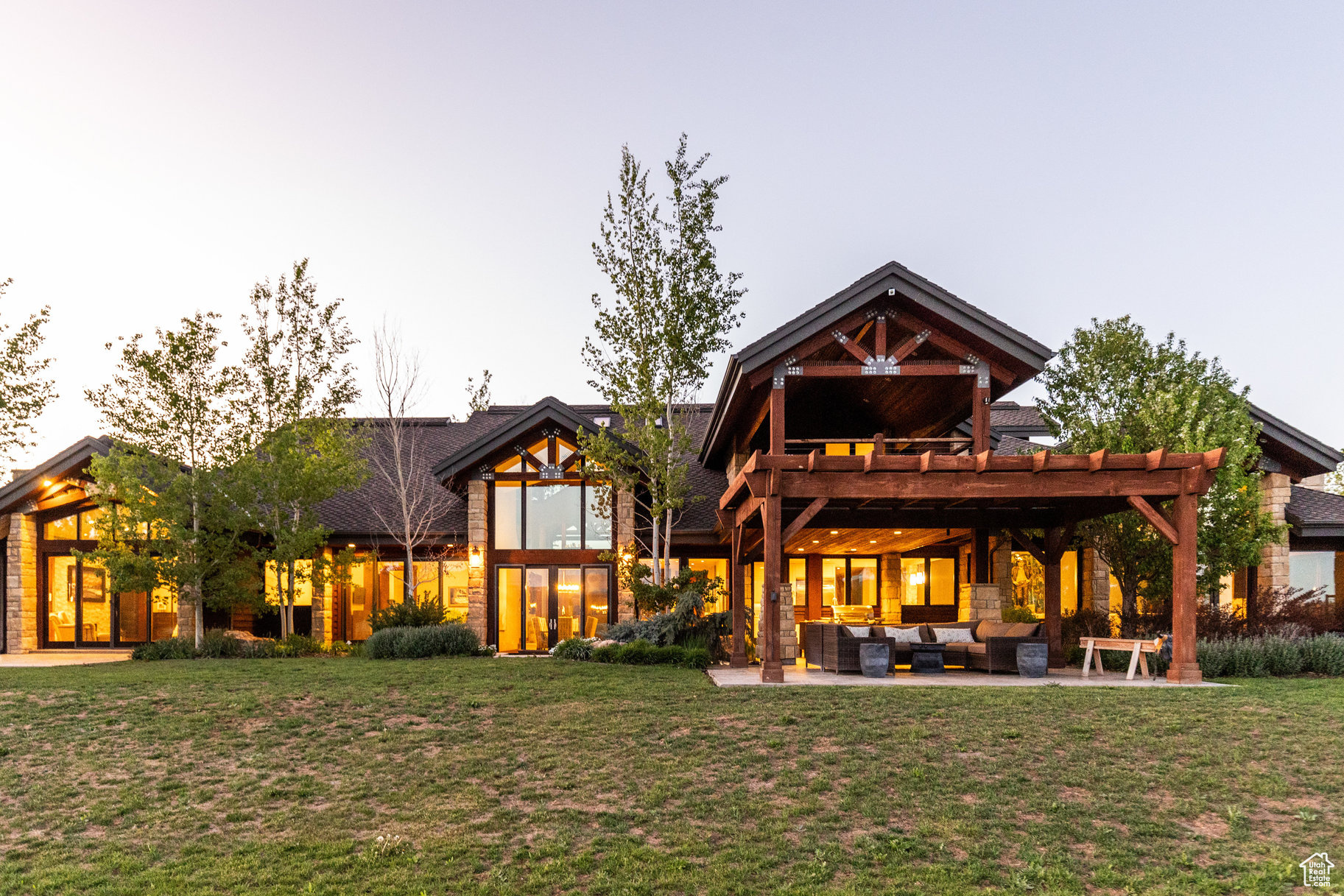 Welcome to Wapiti Ranch, a whimsical 12-acre equestrian property in the Silver Creek neighborhood of Park City. Wapiti Ranch is the epitome of luxury mountain living, horseback riding, and adventuring. Step into the grand foyer of the primary residence, where you are immediately greeted with plenty of light and stunning views of Park City's and Deer Valley's ski slopes, along with the Wasatch Back's ridgeline. The beautiful range can be seen from almost every room in the house. The tranquil primary bedroom is located away from the main entertaining areas of the home, ensuring privacy and providing plenty of space for a spacious bespoke bathroom and custom walk-in closet. The generous two-story living room and bar integrate seamlessly with the outdoor living spaces, kitchen, and formal dining room - perfect for entertaining. Upstairs, a game room and lounge await, connecting to a spacious covered outdoor deck. The 12-acre property is designed as an equestrian enthusiast's treasure, offering a six-stall barn with four walk-out paddocks and an upstairs two-bedroom apartment, a temperature-controlled indoor horse-riding arena with trailer (RV) and tractor storage, an outdoor English riding arena, a large outdoor paddock with two walk-in sheds, two sizeable alfalfa fields, and much more. The property has 3.35 acre-feet of water rights, which is extremely rare for the area.