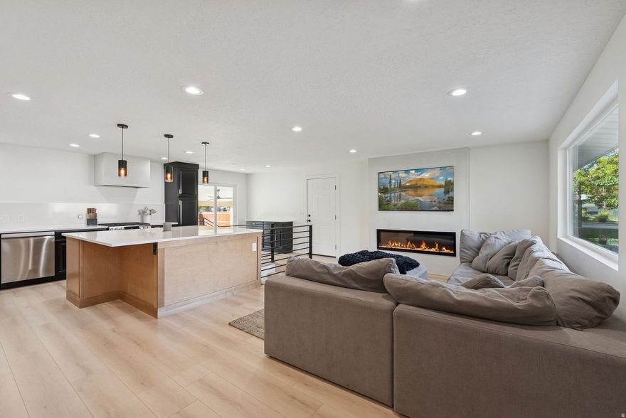 *(1% loan amount)Preferred Lender Incentive offered! Come experience modern comfort in this beautifully updated American Fork rambler. Featuring an open-concept kitchen, designer finishes, and a fully finished basement, this home feels brand new. Enjoy your spacious yard, large driveway with RV parking, plus a two-car garage with workshop/storage space. Location is amazing! Close to parks, schools, shopping, restaurants and freeway access all within 5 minutes. Plenty of storage space, bonus room in the basement could be used as a theater or the concrete bricks can be removed to make it a legal 5th bedroom! *Easy to show! (Square footage figures are provided as a courtesy estimate only and were obtained from county records. Buyer advised to obtain an independent measurement.)  *Listing includes additional parcel making the total lot size is 0.32 acres. Lot: Tax ID 12:075:0041