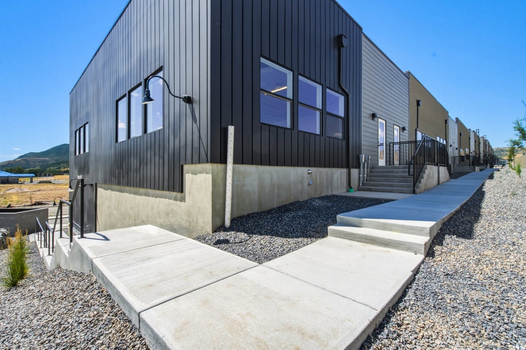 Photo of 5852 N QUEENS GARDEN RD W #1, Mountain Green, UT 84050 (MLS # 2176258)