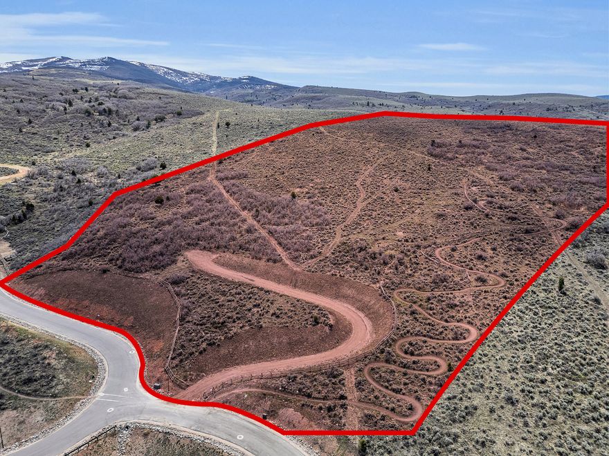 Welcome to your own private oasis in the heart of Heber, Utah! This remarkable 22-acre parcel of land in the exclusive Blue Sage Ranch neighborhood offers an unparalleled opportunity to create your dream estate, perched high above the Heber Valley. Nestled amidst the stunning landscapes of the Valley, this expansive property boasts panoramic views providing a serene backdrop for your vision to unfold. The adjacent mountain bike trail system, golf courses, lakes, ski-resorts within 20 minutes will offer 4 seasons of outdoor enjoyment and adventure, transforming your home to a base camp. With Park City and the Salt Lake City International Airport within a short drive, this location strikes the perfect balance between tranquility and accessibility. Don't miss this rare opportunity to own a piece of paradise in one of Utah's most coveted destinations. Imagine waking up to these unobstructed views, with preserved open space adjacent to the lot, and realizing you've built your home on quite possibly the finest lot in the Heber Valley. Seize the chance to make your dreams a reality  schedule your showing today and unlock the potential of this extraordinary Heber Valley treasure!