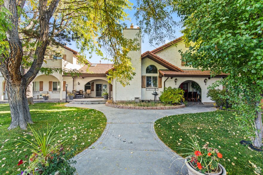 Welcome to your charming sanctuary where timeless architecture meets peaceful country living. This property spans 10.6 acres of usable land and offers endless opportunities.  The main residence has arched details, plenty of gathering space, and tons of storage. The primary bedroom features a private deck with stunning views of the mountains and yard.  Outside, the open patio and private yard are ideal for hosting unforgettable outdoor gatherings, weddings, or simply enjoying evenings under the stars.  Multiple outbuildings offer flexible use as barns, workshops, or storage.  As a bonus, a charming 2-bedroom, 1-bath casita (1,087 sq. ft.) adds value and versatility-ideal for guests, rental income, or multi-generational living.  Don't miss this rare opportunity to own a slice of rural paradise!