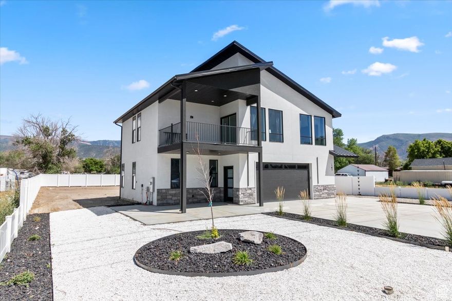 Modern 2023-built two-story home with an upstairs deck and panoramic views in every direction! Partial front yard xeriscaping, fully fenced backyard. Two kitchens and living areas. Backyard offers a blank canvas for your vision-this is a must-see!