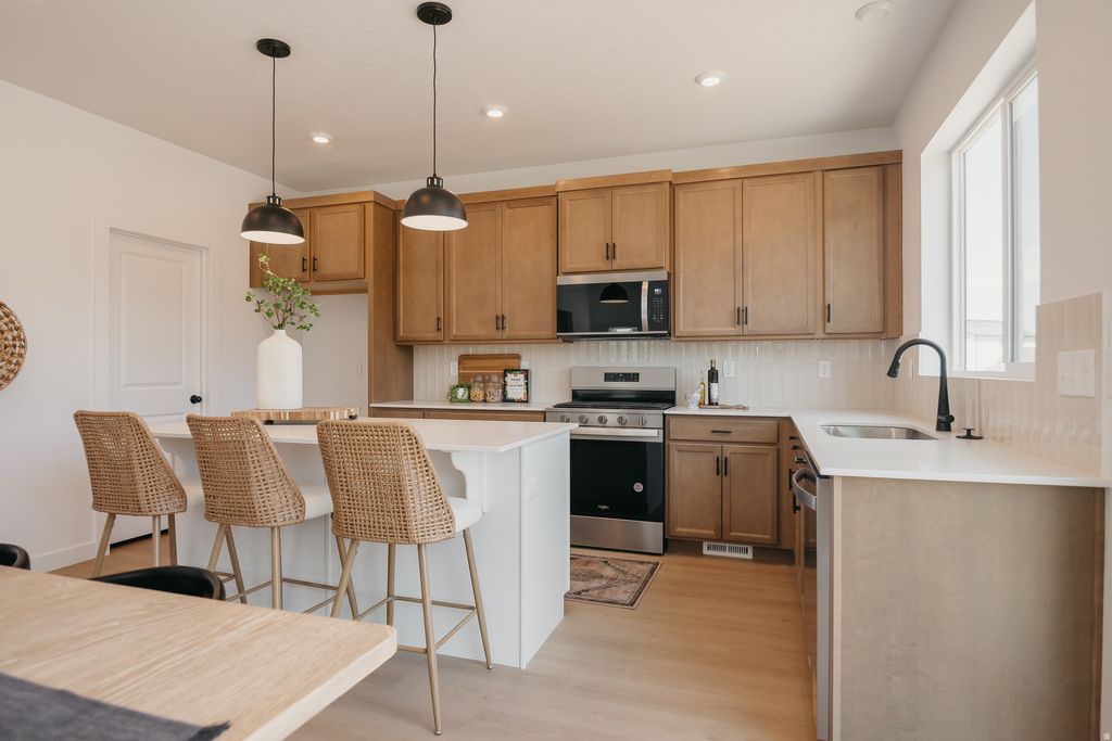 Photo of 944 W COLUMBIA CT #108, Riverdale, UT 84405 (MLS # 2125936)