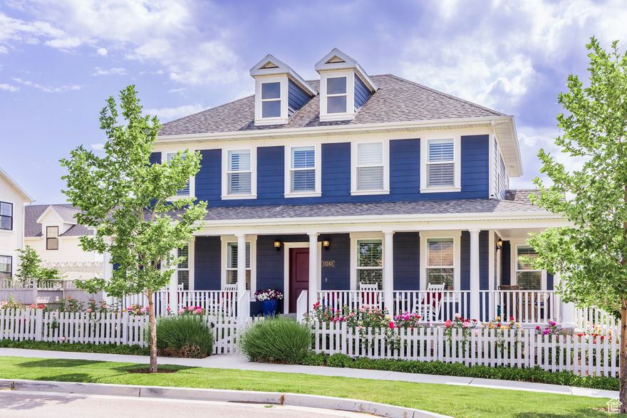 Welcome to this stunning Linden floor plan by Destination Homes, perfectly situated in Highland Park Village of Daybreak. Thanks to its meticulous landscaping with over 50 rose bushes, this Colonial Revival residence exudes timeless charm and exceptional curb appeal. Ideally located directly across from the Watercourse, this home offers a unique lifestyle with immediate access to kayaking, paddleboarding, and even a complimentary community water taxi. Residents also enjoy the amenities of the Cove House-a versatile gathering space featuring a community living room, Daybreak Info Studio, and watercraft checkout station. Step inside and instantly feel at home. The open layout flows beautifully, anchored by a vaulted family room adorned with custom built-ins, beamed ceilings, and pre-wiring for a statement chandelier-balanced with the practicality of dual ceiling fans.  The gourmet kitchen is a chef's dream, equipped with LG double ovens, a gas cooktop, and a spacious walk-in pantry with additional storage. The main-level primary suite is a serene retreat, featuring a spa-like ensuite bathroom. Upstairs, you'll find three generous bedrooms and a full bathroom. All toilets have been upgraded throughout the home.  The fully finished basement includes a mother-in-law apartment with its own kitchen, cozy family room with fireplace, bedroom with ensuite, plus two additional bedrooms, another bathroom, and a finished off cold storage. Basement has 9' ceiling. The apartment is built with hotel-grade sheetrock to eliminate noise from either floor. All basement walls are fully insulated.  Step outside to a beautifully landscaped backyard with a "green fence," blooming rose bushes, and a private hot tub-the perfect space to unwind. Gas line BBQ. Rubbish enclosure built off the garage to eliminate trash receptacles from the garage.  Conveniently located near Aspen Elementary and South Jordan Parkway, this is truly one of Highland Park's premier home locations.  Square footage figures are provided as a courtesy estimate only. Buyer is advised to obtain an independent measurement.