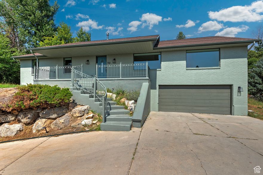 Beautiful Rambler in Prestigious Bountiful Neighborhood Enjoy the rare opportunity to own a spacious home on .48 acres in a highly sought-after area, offering stunning lake and mountain views. This charming rambler features over 3,500 sq. ft. of living space, including four bedrooms and three bathrooms, all situated within an open and flowing floor plan. Natural light floods the interior through large picture windows, creating a warm and inviting atmosphere. The expansive deck provides the perfect outdoor space for relaxation, entertaining, and enjoying privacy amidst the beautiful surroundings. Located with easy access to biking and hiking trails, this home combines convenience with outdoor adventure. Don't miss your chance to own this exceptional property-schedule a viewing today!