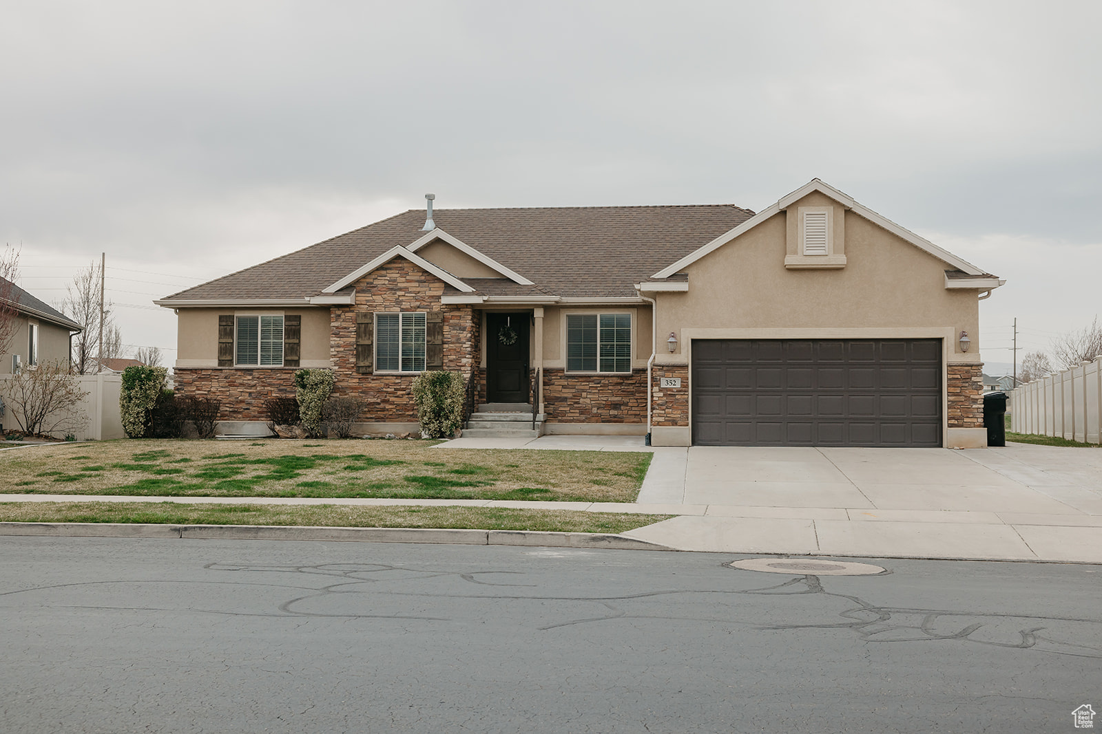 Come home to warmth, comfort, and breathtaking mountain views in this beautifully updated 3-bed, 2-bath Spanish Fork gem. Fresh paint and brand-new carpet welcome you into a space that feels brand new. Gather around the cozy fireplace or host loved ones in the spacious, open family room that flows into the kitchen. With classic black appliances, a gas stove, large island, views from every window and a generous .24-acre lot, this home is ready to hold your memories.