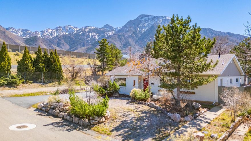 Beautifully maintained single-level living in a highly desirable Holladay location with an unbeatable setting near Belt Route I-215 and just minutes to trails and the canyons! This 3-bedroom, 2 full bath home with an additional 4th room office/den offers comfort and functionality with thoughtful updates throughout, including a remodeled kitchen (2020), new AC (2020), new furnace (2019), and upgraded interior PEX water lines (2019). The oversized detached 2-car garage is a standout-fully finished, insulated, heated, and complete with a spacious workshop and ample storage. Step outside to your private backyard oasis, where every corner invites relaxation and inspiration. Unwind on the covered patio with morning coffee or evening cocktails, host magical summer gatherings under the stars, and let the serenity of the space carry you away. The backyard is complete with a charming new shed with electrical, ready to be transformed into your ideal studio, guest retreat, or private office-interior unfinished and full of potential, plus a four-person cedar barrel sauna and cold plunge-your own private wellness escape. Beyond to the East, on the adjacent UDOT land, a garden space and a second shed that awaits your creative touch-perfect for cultivating your green thumb. Additional parking is also available on the UDOT land (non-permanent use). This is a rare opportunity to own a well-cared-for home in one of Holladay's most desirable areas-where every day feels like a serene getaway.