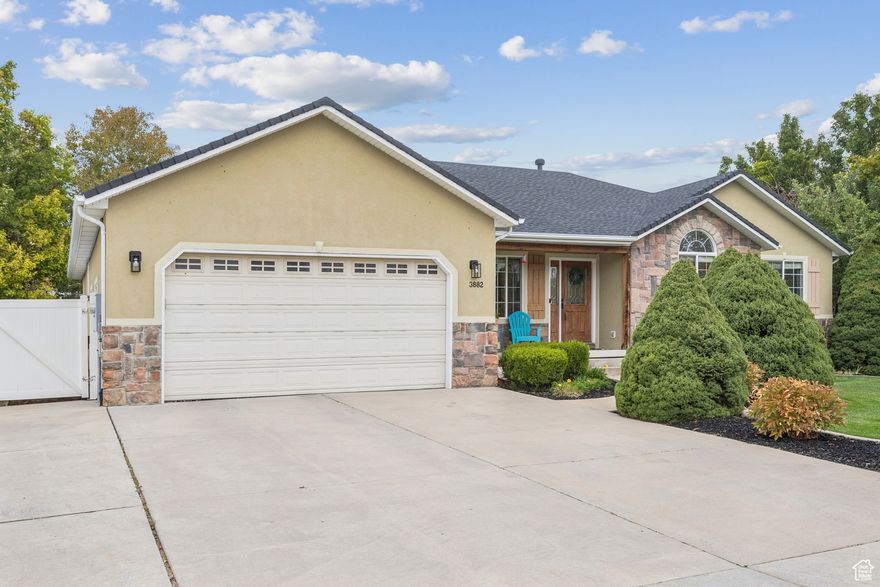 This beautiful 2001 rambler offers 6 bedrooms, 3.5 bathrooms, and a versatile bonus room that has been designed as a private hair salon, ideal for a home business or creative space. Recent upgrades include a brand-new roof (2024), new air conditioner (2023), new dishwasher, and smart home features such as a smart garage door opener, ceiling fan, and Ring doorbell.  The main level highlights open and inviting living spaces, while the basement boasts a spacious family room setup with a projector-perfect for movie nights or game day gatherings.  Outdoors, the backyard is a true retreat with a garden area, private hot tub, small basketball court, and mature shade trees providing comfort and privacy within the fully fenced yard. A two-car garage and RV parking space ensure plenty of room for vehicles, storage, and recreational toys.  Conveniently located just minutes from the new Costco and only 15 minutes from Hill Air Force Base, this home blends everyday functionality with modern updates and lifestyle extras, making it a standout opportunity.  Square footage figures are provided as a courtesy estimate only and were obtained from County Records & Previous listing.  Buyer is advised to obtain an independent measurement.
