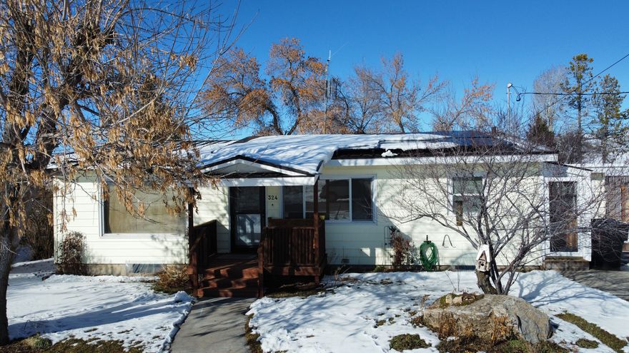 Welcome to this charming 3-bedroom, 1.5-bath home that combines comfort, space, and thoughtful updates. Inside you'll find a spacious kitchen and dining area, an open living room with beautiful laminate flooring, recessed lighting, new carpet, a cozy fireplace, built-in bookcases, and step in shower with bidet. Two wall AC/heater units provide year-round comfort. The basement offers a large family room, pantry, a versatile craft room with built-in cabinets and storage, and abundant additional space. Outdoors includes a workshop with added space upstairs, a wood shed, mature trees, and a PVC sprinkler system. Located in the beautiful and peaceful town of Georgetown, this home blends small-town charm with everyday convenience. For more information or to schedule a showing, contact the listing agent today.