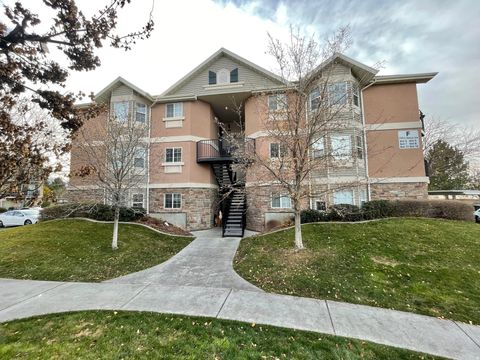 Photo of 3185 MATISSE LN #F 7, West Valley City, UT 84119 (MLS # 2138143)