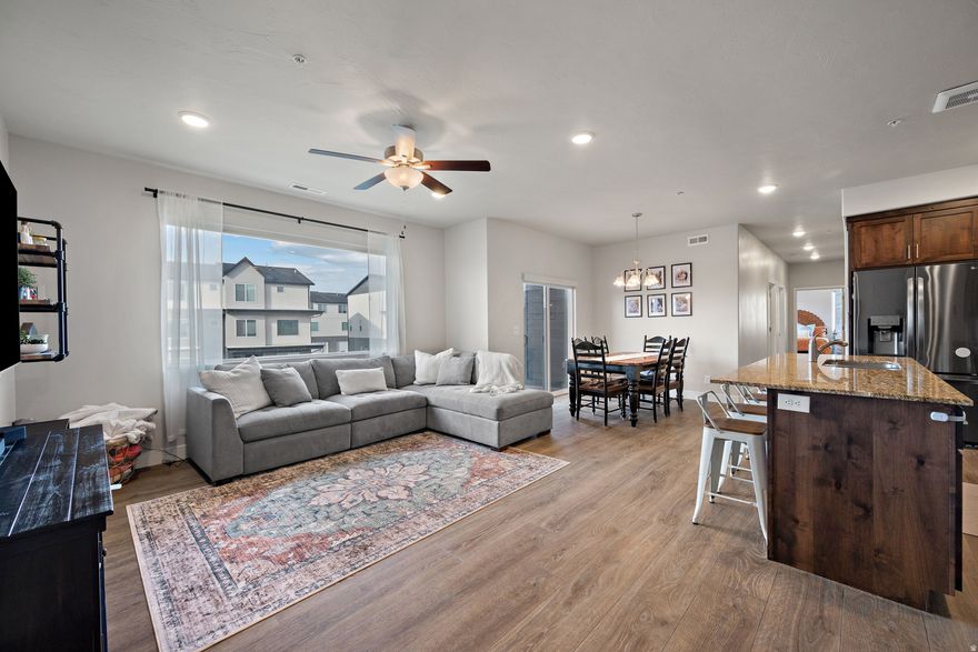 Luxury condo, like-new construction, 2021 build, designer finishes, open concept, high ceilings, chef's kitchen, spa-inspired primary suite, walk-in closet, turnkey, move-in ready, swimming pool, parks, walkways, low maintenance, lock-and-leave, commuter friendly, walkable, Trax access, Utah Lake, I-15 access, executive and high end living, premier location.   Square footage figures are provided as a courtesy estimate only and were obtained from Utah county Records.  Buyer is advised to obtain an independent measurement.