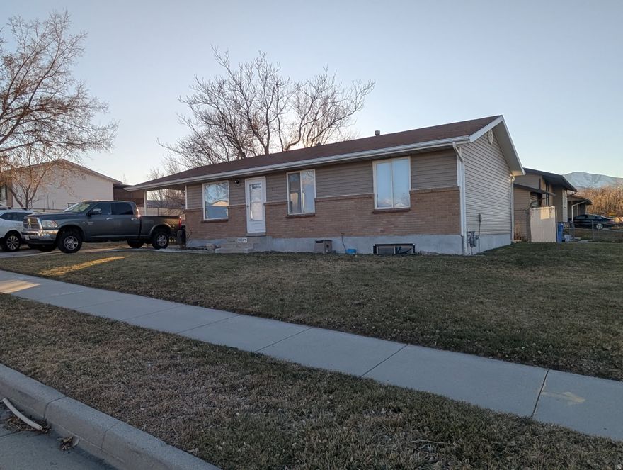 This rambler is ready for a new family...Great neighborhood, located on a corner lot and features newer appliances, new paint, blinds, carpet & laminate flooring throughout. 3 bedrooms on the main level. Huge family room downstairs, nice large storage area and plenty of room for additional bedroom and bath.