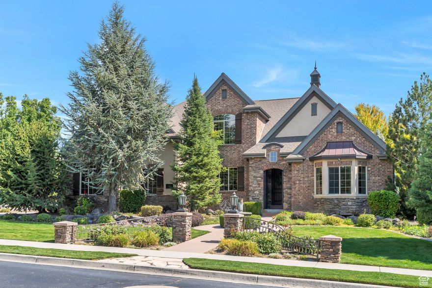 Nothing is wanting in this home. A getaway in the mountains. A must see! it is rich with upgrades. Gas Lanterns, exquisite wrought iron with Tuscan water feature invite you to come and stay from the curb. Beautiful, open kitchen and family room for large gatherings with breathtaking views.  Main level primary is large and inviting with magnificent master bath, shower and large walk in closet. A private themed castle theater room includes all equipment with built in seating. Incredible resort back yard with swimming pool, including low maintenance saltwater system, pebble finish, color lighting, diving board, slide with custom cut flagstone deck and shooting fountains. A separate Marquee hot tub with tv mount. Hawaiian in-ground gas Tiki Torches surround the entire backyard and Tuscan pots waterfall fountain. A gas rock fire pit with heater and custom bubble lighting. A stone surrounded in-ground trampoline. Tankless water heater & new AC units. Stone walk out basement and window wells with completely fenced in backyard.  All mounted/attached TV's are included. All bathrooms have bidets. Commercial central vac. The basement has an additional media family room with a  7.1 surround sound and game area for all ages. Basement has a Fort Knox fireproof cement in wall walk-in safe. Garage has a 4th car lift, heater, hydraulic mounted tv and custom cabinets. RV parking.  Automated google home features including six cameras. Automated scented vents & HVAC blue light LED germ killer. Square footage figures are provided as a courtesy estimate only. Buyer is advised to obtain an independent measurement. Owner Agent.