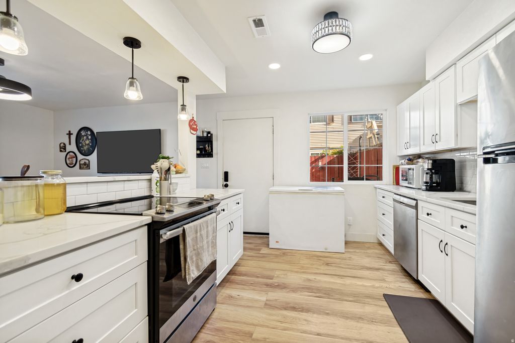 Photo of 1808 W HOMESTEAD FARM LN #4, West Valley City, UT 84119 (MLS # 2156740)