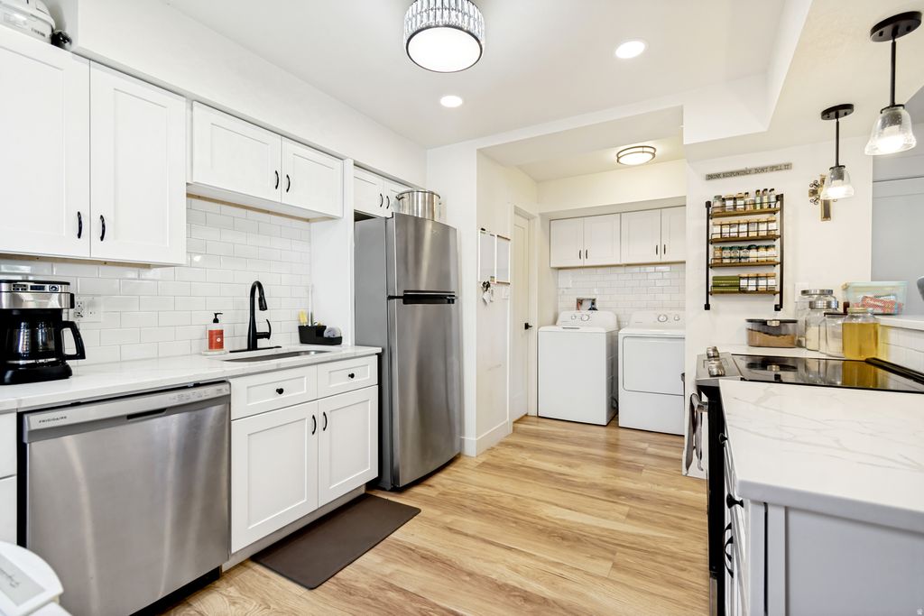 Photo of 1808 W HOMESTEAD FARM LN #4, West Valley City, UT 84119 (MLS # 2156740)