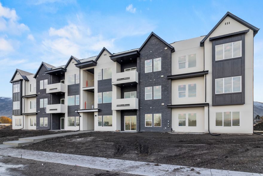 Come get a heck of a deal in the beautiful Ridgeline Park community in Nibley. This is a top-floor condo unit, with tons of natural light pouring in and not one, but TWO private balconies, one off the great room and one off the primary bedroom. Three full bedrooms, 2 bathrooms, and a very easy-flowing layout. An incredible opportunity to be in a neighborhood beaming with activity at one of the many in-community amenities, such as the pool, clubhouse, walking trails, pickleball courts, playgrounds, and a future 18-acre Nibley City park coming in the heart of the community.