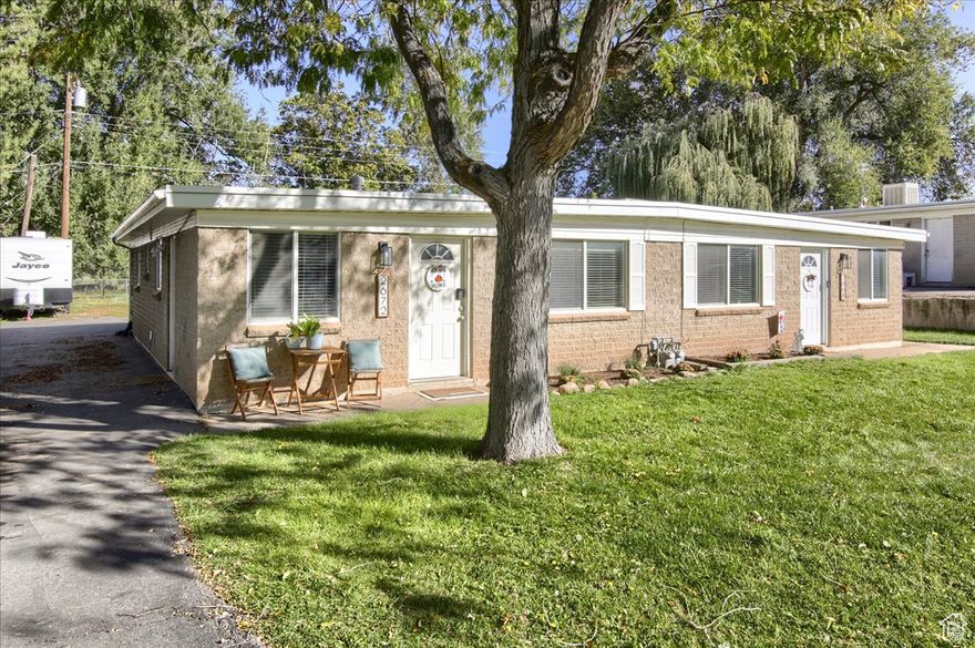 No need to lift a finger! Come discover a beautifully maintained side-by-side all-brick duplex in the heart of Roy - a fantastic investment opportunity or ideal setup for an owner-occupant. This property has been well loved and meticulously cared for, making it a true standout in today's market.  Each unit offers spacious, light-filled living areas with large windows that bring in plenty of natural light, creating a bright and inviting atmosphere. The classic brick ensures low maintenance and lasting durability.  With excellent long-term rental potential, strong area demand, and a property that shows true pride of ownership, this is the kind of investment that doesn't come along often.