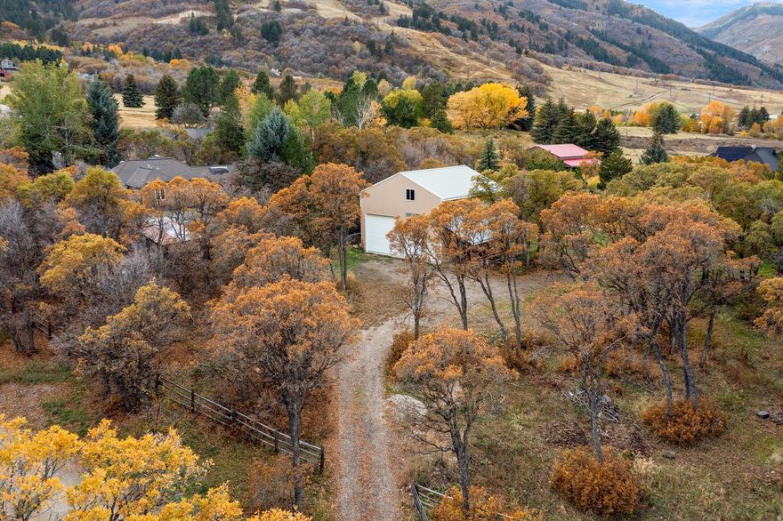 Build your getaway dream home, or take advantage of this 1.05 acre lot with a 2,800sf two-story barn as-is. That's right, this grandfathered parcel is not only buildable, but it's one of the only lots in Ogden Valley to have an accessory building on it without the requirements of a residence! Very rare opportunity to store your toys or have a workshop, without the expense of having a home on the property. The 35x40  barn is built on a concrete foundation, standard framing, floor joists, and roof trusses. It is not a simple pole barn, and has potential for a barndominium conversion with city/county approval. It has a 14x16' door for oversized RV on one side, with an 8x8' door and separate space on the other. It's waiting to be finished into a workshop or someone's dream toy barn. Upstairs you will find 1,653sf of rough-in subflooring, framing and insane views of Nordic Mountain. Outside a spectacular setting awaits with 2 ponds, one of which is spring fed and filled with small fish. There are mature trees, wildlife, views and a private driveway. Utilities are in the road and a Perc Test is underway. Information is provided as a courtesy. Buyer is advised to obtain and confirm all pertinent information with city or county.