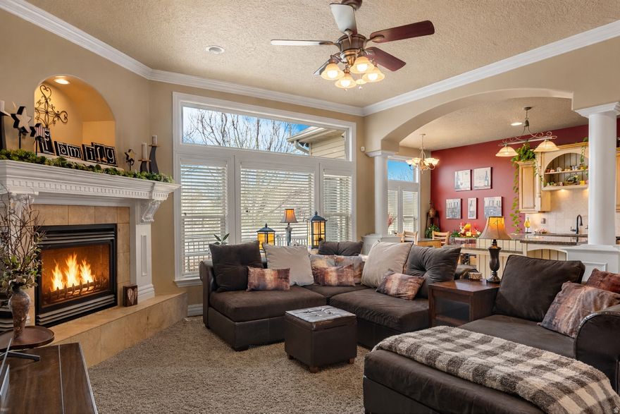 Custom-built rambler in the highly sought-after Hawthorne community in Syracuse UT, offering over 3,600 sq ft of elevated living on a spacious .30-acre lot.  The main level showcases a bright, open layout with refined finishes throughout, including a designer kitchen with two-tone cabinetry, granite countertops, and a seamless flow into the great room-perfect for both everyday living and entertaining. The expansive primary suite is designed as a true private retreat, complemented by a spa-inspired bath featuring a soaking tub and separate shower.  The fully finished walkout basement features 9-foot ceilings, a spacious family room with direct outdoor access, and a custom built-in bar with excellent potential to convert into a full secondary kitchen-ideal for entertaining or multi-generational living.  Step outside to a beautifully landscaped backyard retreat complete with a firepit, creating the perfect setting for relaxing evenings or hosting guests.