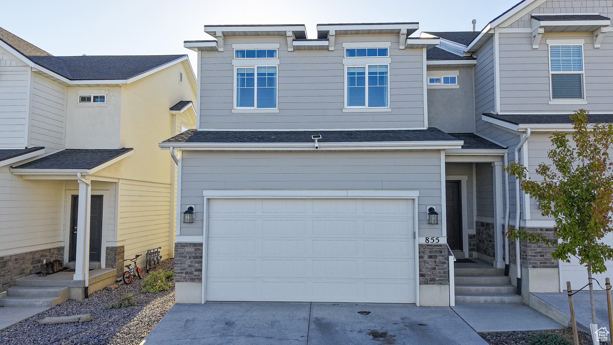 Be sure to check out the 3D tour. Beautiful end-unit townhome featuring no backyard neighbors for added privacy. The inviting front entry with a foyer leads to an open, modern layout with 9-foot ceilings, recessed lighting, and upgraded finishes throughout. The kitchen showcases sleek white 42" cabinetry, quartz countertops, stainless steel appliances (fridge included), and durable LVP flooring. The spacious master suite is a true retreat with a tray ceiling, an oversized walk-in closet, and a luxurious master bath complete with double vanities, a soaking tub, and a separate shower. Additional highlights include a large walk-in laundry room, upgraded stair railings, modern carpet, and keyless entry. The home offers practical features such as an unfinished basement for future expansion, a high-efficiency furnace, and a convenient half bath on the main floor. Enjoy extra parking in front of the garage and the benefit of lower property taxes-this property is not in a Planned Infrastructure Development.
