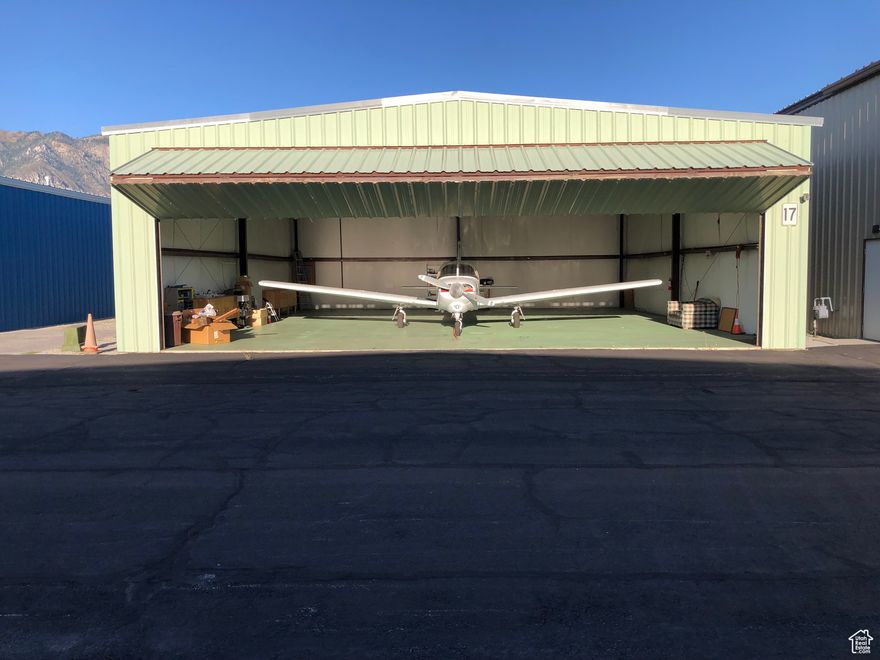Huge price reduction!!! This 45x50 private hanger features a 40x19 foot bi-fold door with sturdy cables, and a manual door latch. Inside you will find a natural gas heater mounted to the ceiling, fully insulated walls and ceiling, and upgraded LED lights. Conveniently positioned on the south side of the airport just off the runway. The main door faces west, offering easy access. The land lease makes this hanger eligible for trusts and 1031 exchanges. Land lease is $677.98 per year. Don't miss this incredible opportunity to own a hangar in beautiful Brigham City! Must be used for aircraft. Brigham City Municipal Airport (BMC) is a public airport in Brigham City, Utah, located right off the freeway, 9 miles from downtown, and 60 miles to Salt Lake City. Covering 254 acres, KBMC serves general aviation, private pilots, flight training, and corporate flights. The facility has two asphalt runways, with the primary runway stretching 8,900 feet and 100 feet wide of grooved asphalt. There is a pilots lounge available. and the airport is equipped with modern navigational aids, hangars, and maintenance services. The airport supports the region's transportation and economic growth, accommodating aircraft from single-engine planes to business jets.