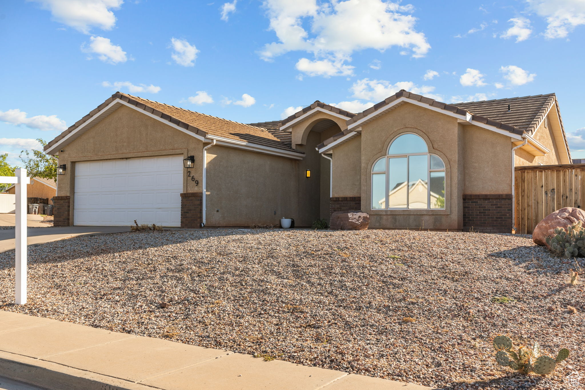 Welcome to this beautifully updated single-level home in the heart of Ivins, surrounded by stunning red rock views! Very close to the new Black Desert Golf Course and Resort! Featuring 3 bedrooms and 2 bathrooms, this home was remodeled in 2022 with modern finishes throughout - including a refreshed kitchen, updated flooring, and fully renovated bathrooms. The plumbing has been updated as well, offering added peace of mind. Enjoy the low-maintenance lifestyle with a fully fenced yard and brand new turf installed in 2023-perfect for relaxing or entertaining without the upkeep. Located in a quiet neighborhood with no HOA, this home is just minutes from local elementary schools, Rocky Vista Medical School, and outdoor recreation.