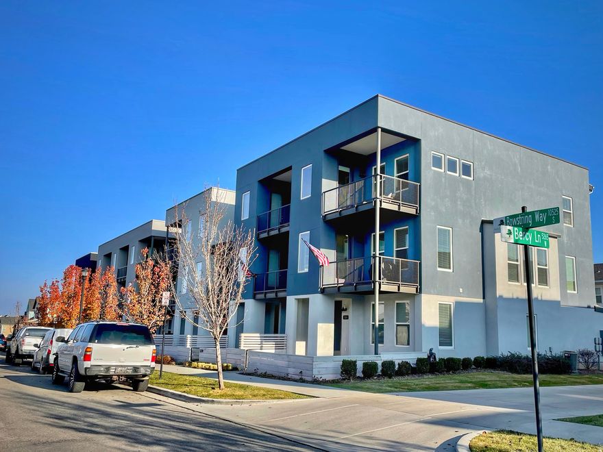 Beautifully updated townhome in the heart of Daybreak. This bright and airy end unit offers abundant windows, natural light, and 10 ft ceilings in the family room, dining area, and primary bedroom. 5-inch baseboards and contemporary metal railings add to the clean, modern feel. Thoughtful finishes throughout and over 40k in upgrades, including two-tone paint, upgraded kitchen cabinetry, quartz countertops throughout,  a gas range and stove, a 50-gallon water heater, water softener, reverse osmosis system, and a double-shower setup in the primary suite... for some high quality shower time. The extra-deep garage with included built-in storage, is perfect for a home gym, large truck, or additional storage needs. Its also includes a charging station for your EVs. Then for the pice de rsistance... the outdoor space. With two levels of corner decks, and a large, welcoming front porch and patio, you will love your morning coffee time, and will never want to miss another evening sunset.   Located in one of Utah's most sought-after master-planned communities, this home offers access to an unmatched lineup of amenities: Multiple community pools. Oquirrh Lake with kayaking, paddle boarding & walking paths. Dozens of parks, playgrounds & sports courts. Miles of hiking and biking trails. Splash pads, community gardens & a vibrant community center. Harmons Neighborhood Grocery just minutes away. American First Ballpark for year-round entertainment. Seasonal outdoor ice skating rink. Walkable restaurants, cafs, and shops throughout SoDa Row. Convenient access to TRAX, schools, and the new library & recreation center. Daybreak is known for its walkability, mountain views, and strong community feel-offering the perfect blend of convenience, outdoor living, and lifestyle amenities right outside your door.   Selling this home is bittersweet for the family who lived here. So many memories made... so much love and joy infused in her walls. Their years on Bowstring Way will be forever treasured. Schedule a tour today and experience for yourself what a special home this is.