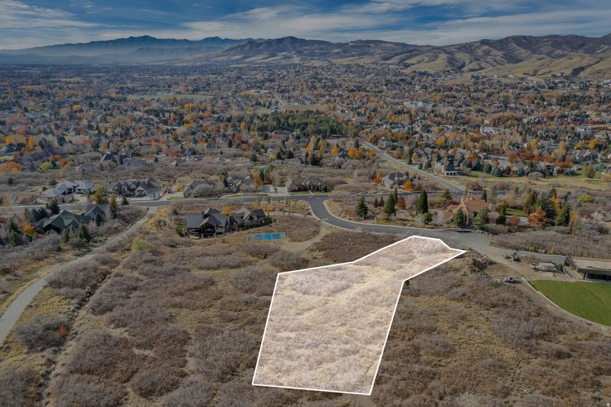 This is a truly rare opportunity to own a 1.38-acre East Bench lot in Alpine. Last remaining lot in this premier location. Nestled on a quiet cul-de-sac with unobstructed lake, mountain, and valley views, this property offers an unmatched combination of privacy and scenery. The lot includes access to 17.13 acres of common area and borders U.S. Forest Service land, providing endless space and direct access to open wilderness. The lot lines here are unlike anything you'll find today, neighboring custom homes are set far apart, with acres of open space between each property, so no lots touch. You'll enjoy the peace and privacy of estate living with panoramic 360-degree views all around. Don't miss this chance to build your dream home on one of Alpine's most coveted pieces of ground.