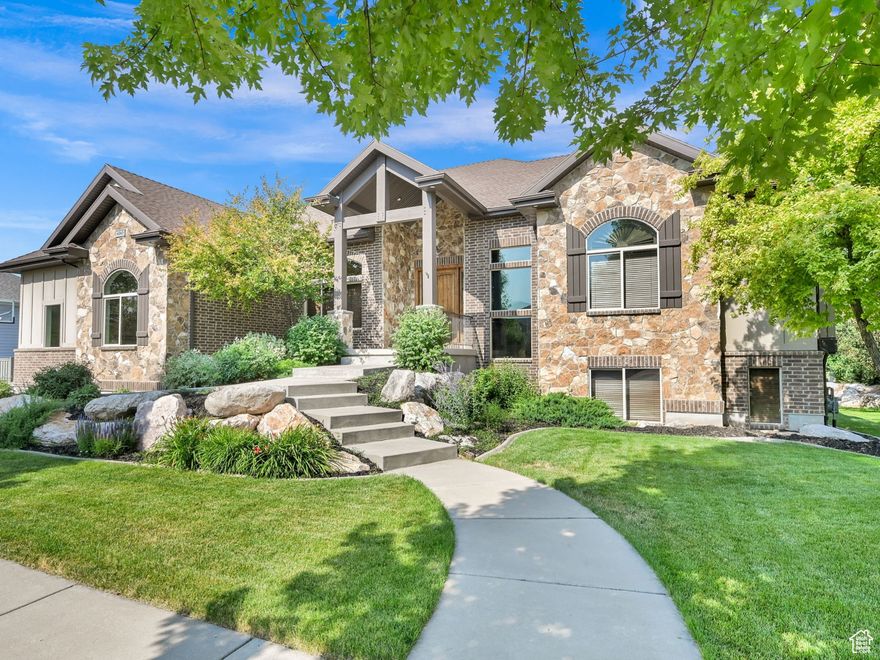 AN ASSUMABLE 2.5% VA LOAN IS AVAILABLE WITH QUALIFICATIONS. Welcome to this beautiful custom-home in the highly-sought-after Rollings Ranch neighborhood in Mountain Green.  Luxury homes, tree-lined streets, walking paths, and hiking trails just out your front door makes this neighborhood a premier location in the area.   The quality architecture, elegant landscaping, mature trees, lush lawn and exterior stone finishes provide all the curb-appeal you would desire from this 4,954 sf custom-built home.  The quality and comfort of this home is apparent throughout.  The vaulted ceilings, large custom beams and stone covered fireplace set the tone for the quality of the construction.  The large, yet cozy, living room features oversized windows and french doors to bring in plenty of natural light and provide amazing views of SnowBasin and the Wasatch Mountains.  The spacious covered deck offers plenty of shade for grilling, enjoying the outdoor dining area or just relaxing and taking in the mountain views.  The main level owner's suite, home office with custom built-ins, main-floor laundry room and two additional bedrooms and bathrooms make up the main level.  Downstairs is a formal living room, huge family room with an additional stone covered fireplace, more oversized windows, french doors to a covered patio, as well as an additional bedroom and bathroom.  A large storage room and a large unfinished room in the basement provides massive amounts of storage space or the opportunity to customize to suit your needs.  Maybe additional bedrooms, a home gym, another home office or just simply leave as a storage room.  The three-car garage provides extra height and length allowing for plenty of room to store all of the toys.  An additional pad alongside the garage provides an RV parking pad as well as a basketball hoop for some outdoor fun.  This mountain community boasts a new retail center and Lee's Marketplace just a short walk or bike ride down the road. Mountain Green is a growing mountain town that is a mere 38 miles from Salt Lake City International Airport and is just minutes from Snowbasin and a short drive to Powder Mountain, Nordic Valley, several golf courses, and reservoirs!  The home is located just 20 minutes to Ogden, and just a little over an hour to Park City.  City close but country quiet!!   The community feels like "Small Town USA" where folks still walk in the evenings and chat with neighbors.  An assumable 2.5% VA loan is available with qualifications, see agent notes for balance and rate.  The Square footage figures are provided as a courtesy estimate only and were obtained from County Records .  Buyer is advised to obtain an independent measurement.