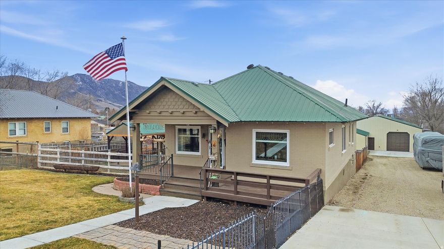 Step into this delightful 1917 bungalow, lovingly updated with fresh wiring, plumbing, a new water heater, newer central air conditioning and furnace-all on a huge 0.70-acre lot. Classic charm in every detail. Inside you'll love the bright new windows, stunning custom woodwork, premium floors, and craftsman charm. The revamped kitchen shines with handmade cabinets and granite counters that'll inspire any chef! Single Level living, with laundry and 3 beds, and tiled bath with walk-in shower all on the main floor! Backyard bliss includes a giant 40x60 shop with its own meter, 4 sheds, a garage, covered porch and deck with pergola, plus a fenced yard for endless fun. Ideal for family hangouts and making memories-come see it soon!