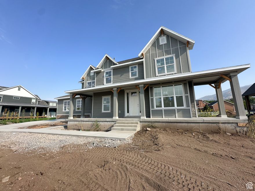 Drive down the highly desirable new Cottle Lane in Farmington and come see one of only two homes remaining for sale on the lane. Introducing the Victor Home on our lot #5 of the lane, this home is sure to have everything you are looking for and more! As you approach the home, not only will you see all of the other custom newly built homes that bring so much beauty to the street, but you will quickly be greeted to the charming full oversized front porch! As you enter inside the home, your eyes will drift up towards the high two-story ceilings peeking up towards the second level of the home. There are both a den and a formal living room positioned on the front side of the house. Towards the back you will have full privacy as you enjoy your open-concept family room and kitchen space. Get ready to cozy up by the fireplace & beautifully designed mantel as cooler weather approaches while comfortably sitting in your family room. Right off of the family & kitchen area is an oversized covered back deck that will be an entertainment or grilling lovers dream! The kitchen will feature a large kitchen island, ample amount of high quality soft closing cabinetry and a VERY spacious walk-in pantry that will make any storage seeker swoon. With storage in mind, you will be delighted to see the mudroom area featuring custom built-in cubbys & bench, as well as TWO coat/utility closets and a powder bathroom for guests.   On the upper level of your home, you will find the master bedroom suite  featuring a charming large window that looks out onto the front yard as well as tall vaulted ceilings that elevates the whole feel & design of the room. The master has its own private on-suite bathroom with both a shower and separate tub. A linen closet, private toilet room, double sink vanity, and best of all the oversized walk-in closet. This closet went above our standard building in terms of customization will full shelving, a built in bench and cubby boxes, shoe shelves etc...you will also get natural light with the extra windows placed within the closet. If that was not enough storage, in the hallway upstairs is another very large storage closet with shelving, a spacious laundry room, additional full bathroom, and three more bedrooms all with well made custom built shelving included.   Lastly, this home has a wonderful 2-car garage attached to the home PLUS an additional 2-car shop garage with length needed to store any of your fun outdoor adventure toys & gear! No HOA dues for Cottle Lane.  Seller is currently offering a generous buyers concession to help with rate buy-down options. Please call me for any and all details.