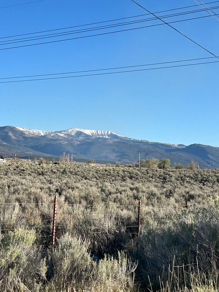Spacious property located on the outskirts of Mt. Pleasant, offering exceptional potential for a wide variety of uses. This desirable location is conveniently close to town amenities. With ample space and flexibility, the opportunities for this property are truly extensive.