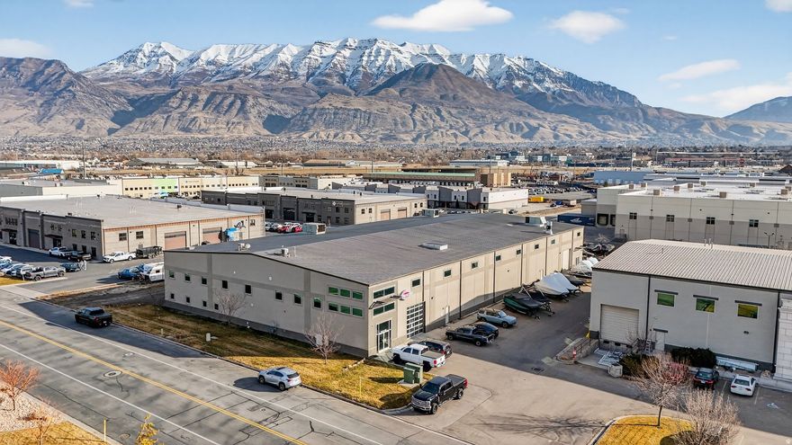 This 27,332 SF industrial flex facility in Vineyard offers a combination of features that are nearly impossible to replicate in today's market: a true free-span interior, 28-foot clear height, and six oversized 14' x 12' grade-level doors, all positioned on 1.77 acres with immediate access to I-15. The wide-open floor plan delivers unmatched flexibility for warehouse, distribution, light manufacturing, and specialized flex users, allowing operations to scale, reconfigure, and grow without the physical constraints found in conventional industrial buildings. Located near the Utah City master-planned development, this property benefits from long-term regional growth, infrastructure investment, and a rapidly expanding workforce base. With freeway visibility, strong site coverage, and a modern metal-and-EIFS construction profile, the building offers both functional performance and future value. Whether for an owner-user seeking a flagship facility or an investor targeting a durable, high-demand industrial asset, this is a rare opportunity to secure a truly irreplaceable property in the heart of Utah County.