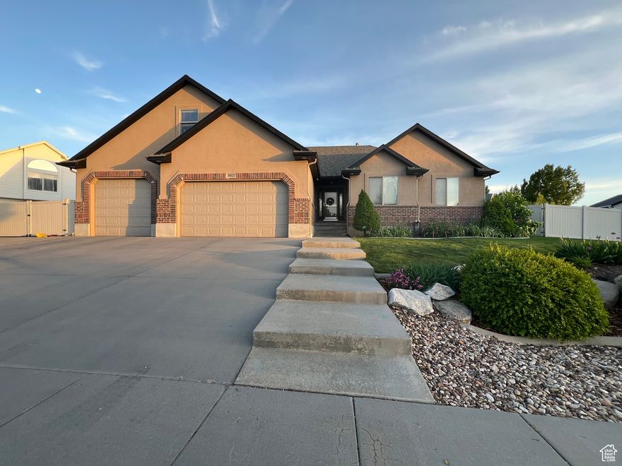 Beautifully updated home in established neighborhood, near new park and elementary school. Large family room, LVT throughout the main floor. Updated bathrooms and kitchen, with granite countertops. New roof in 2024 with 50 year architectural shingles, fully fenced and landscaped with mature fruit trees, garden boxes, and large RV pad. Huge 4 car garage with epoxy floor for quick and easy cleanups. 2-50 gallon water heaters with hot water recirculating system. Water softener. Bonus room above garage with own air conditioner; awesome flex space, can be used for office, craft, home gym, bedroom, whatever is needed. One owner.